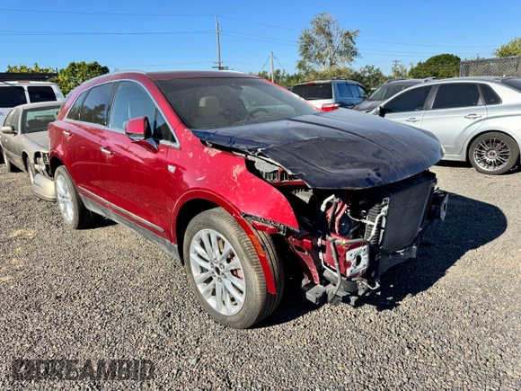 2019 Cadillac XT5 Premium Luxury AWD with VIN 1GYKNFRS2KZ251595, listed as a Copart auction lot 65834135 with 23,925 mi miles and Salvage title. Bid and sale history available at DreamBid. Image 1.