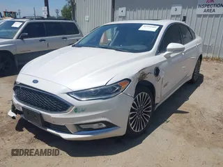 2017 Ford Fusion Titanium z VIN 3FA6P0SU0HR329224, wystawiony jako IAAI lot #42291605 z przebiegiem 176 728 mil mil oraz . Historia ofert i sprzedaży dostępna na DreamBid. Obrazek 20.
