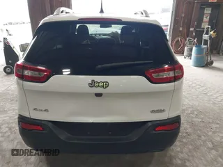 2014 Jeep Cherokee Altitude with VIN 1C4PJMCB7EW186432, listed as a IAAI auction lot 42076018 with 150,186 mi miles and . Bid and sale history available at DreamBid. Image 16.