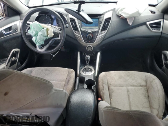 2014 Hyundai Veloster z VIN KMHTC6AD3EU198500, wystawiony jako Copart lot #56943915 z przebiegiem 118 173 mil mil oraz Czysty tytuł • Clean title. Historia ofert i sprzedaży dostępna na DreamBid. Obrazek 8.