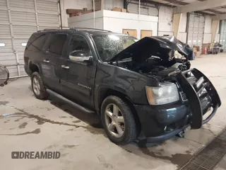 2011 Chevrolet Suburban LT z VIN 1GNSKJE35BR243708, wystawiony jako IAAI lot #41718525 z przebiegiem 216 145 mil mil oraz . Historia ofert i sprzedaży dostępna na DreamBid. Obrazek 1.