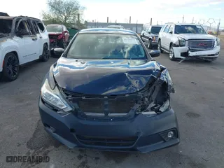 2017 Nissan Altima 2.5 SV with VIN 1N4AL3APXHC172982, listed as a IAAI auction lot 41733473 with 118,738 mi miles. Bid and sale history available at carsss.com. Image 13.