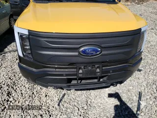 2023 Ford F-150 Lightning Pro with VIN 1FTVW1EL7PWG11261, listed as a Copart auction lot 47032775 with Not Provided miles and Salvage Title. Bid and sale history available at DreamBid. Image 11.