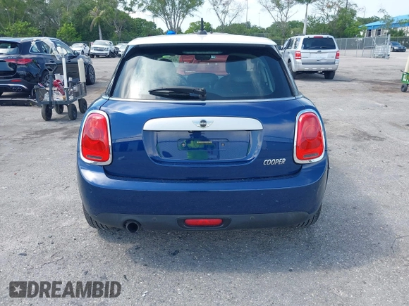 2015 MINI Hardtop 4 Door with VIN WMWXS5C51FT827510, listed as a IAAI auction lot 42365599 with 53,667 mi miles and . Bid and sale history available at DreamBid. Image 16.