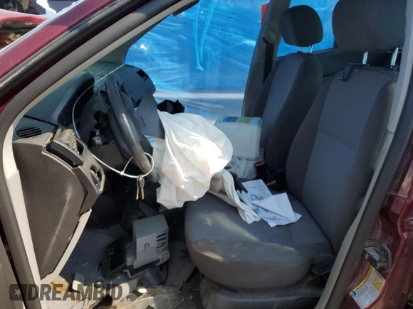 2007 Ford Focus S with VIN 1FAFP34N87W142767, listed as a Copart auction lot 58484605 with Not provided miles and Salvage title. Bid and sale history available at DreamBid. Image 7.
