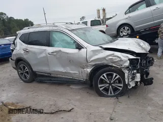 2017 Nissan Rogue SV with VIN JN8AT2MT7HW143178, listed as a IAAI auction lot 41015343 with 139,828 mi miles and . Bid and sale history available at DreamBid. Image 14.