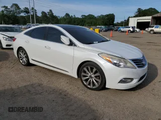 2014 Hyundai Azera Limited z VIN KMHFH4JG3EA352749, wystawiony jako Copart lot #55457525 z przebiegiem Nie podano mil oraz Szkoda całkowita • Salvage title. Historia ofert i sprzedaży dostępna na DreamBid. Obrazek 4.