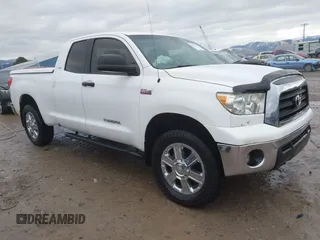 2008 Toyota Tundra 4WD Truck with VIN 5TFBV54178X082340, listed as a IAAI auction lot 40957994 with 216,128 mi miles. Bid and sale history available at carsss.com. Image 1.