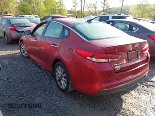2018 Kia Optima LX z VIN 5XXGT4L35JG236890, wystawiony jako IAAI lot #41940813 z przebiegiem 138 898 mil mil oraz . Historia ofert i sprzedaży dostępna na DreamBid. Obrazek 3.