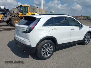 2020 Cadillac XT4 FWD Sport with VIN 1GYFZER4XLF116224, listed as a IAAI auction lot 42759271 with 31,395 mi miles and . Bid and sale history available at DreamBid. Image 4.