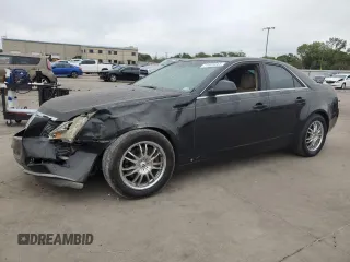 2009 Cadillac CTS RWD w/1SA with VIN 1G6DF577890122363, listed as a Copart auction lot 71401644 with 127,968 mi miles and Salvage Title. Bid and sale history available at carsss.com. Image 1.