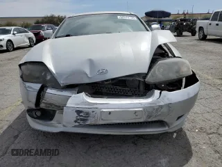 2006 Hyundai Tiburon GT z VIN KMHHN65F06U203701, wystawiony jako Copart lot #52374135 z przebiegiem 90 796 mil mil oraz Szkody całkowita. Historia ofert i sprzedaży dostępna na DreamBid. Obrazek 5.