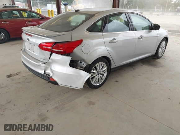 2017 Ford Focus Titanium с VIN 1FADP3J29HL329410, выставлен на аукционе IAAI как лот 42493519 с пробегом 22 639 миль миль и . История ставок и продаж доступна на DreamBid. Изображение 4.