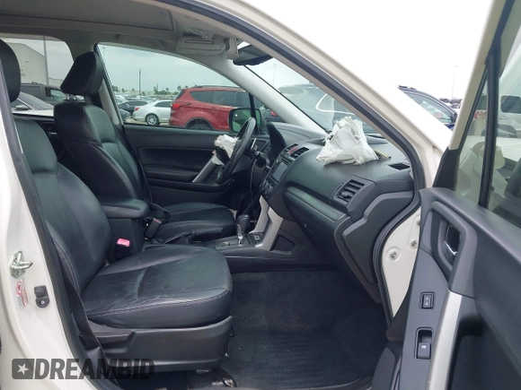 2014 Subaru Forester XT Touring with VIN JF2SJGMC4EH555465, listed as a IAAI auction lot 42357371 with 168,378 mi miles and . Bid and sale history available at DreamBid. Image 5.