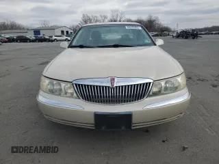 2001 Lincoln Continental with VIN 1LNHM97V71Y711352, listed as a Copart auction lot 46235305 with 122,786 mi miles and Salvage Title. Bid and sale history available at DreamBid. Image 5.