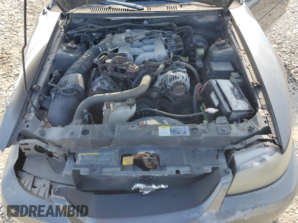 2004 Ford Mustang Standard with VIN 1FAFP40674F229138, listed as a Copart auction lot 56186445 with 128,566 mi miles and Salvage title. Bid and sale history available at DreamBid. Image 11.