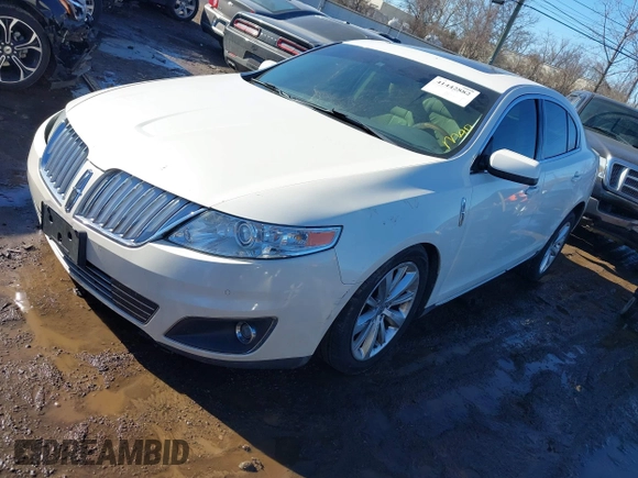 2009 Lincoln MKS с VIN 1LNHM94R09G615426, выставлен на аукционе IAAI как лот 41442882 с пробегом 184 615 миль миль и . История ставок и продаж доступна на DreamBid. Изображение 2.