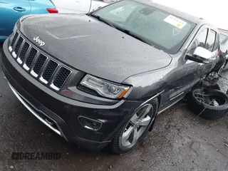 2014 Jeep Grand Cherokee Overland with VIN 1C4RJFCT2EC146239, listed as a IAAI auction lot 41368514 with 164,239 mi miles. Bid and sale history available at carsss.com. Image 2.