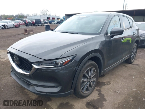 2017 Mazda CX-5 Grand Touring with VIN JM3KFBDL3H0143194, listed as a IAAI auction lot 42049258 with 74,159 mi miles. Bid and sale history available at carsss.com. Image 17.