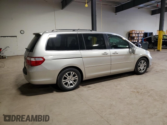 2007 Honda Odyssey Touring z VIN 5FNRL38887B102328, wystawiony jako Copart lot #52113595 z przebiegiem 105 394 mil mil oraz Szkoda całkowita • Salvage title. Historia ofert i sprzedaży dostępna na DreamBid. Obrazek 3.