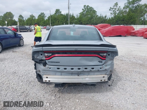 2022 Dodge Charger R/T with VIN 2C3CDXCTXNH240387, listed as a IAAI auction lot 42471923 with 66,616 mi miles and . Bid and sale history available at DreamBid. Image 17.