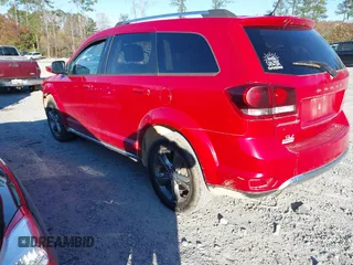 2017 Dodge Journey Crossroad Plus z VIN 3C4PDCGG1HT548160, wystawiony jako IAAI lot #40948489 z przebiegiem 129 427 mil mil oraz . Historia ofert i sprzedaży dostępna na DreamBid. Obrazek 3.