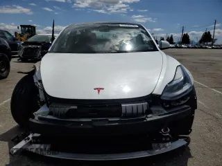 2022 Tesla Model 3 Long Range with VIN 5YJ3E1EB4NF139023, listed as a Copart auction lot 51410345 with 54,789 mi miles and Salvage Title. Bid and sale history available at DreamBid. Image 5.