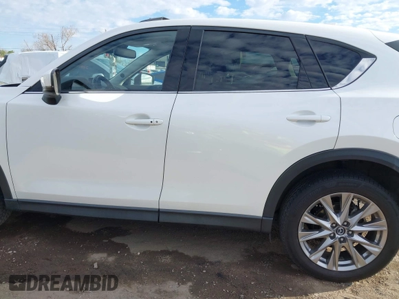 2019 Mazda CX-5 Grand Touring with VIN JM3KFBDM8K0518576, listed as a IAAI auction lot 41854296 with 88,706 mi miles and . Bid and sale history available at carsss.com. Image 14.