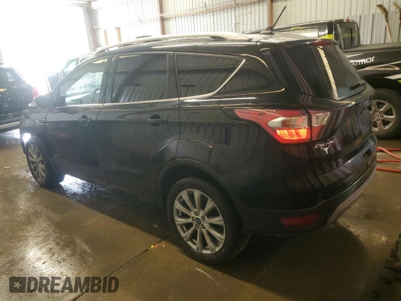 2018 Ford Escape Titanium with VIN 1FMCU9J9XJUA01357, listed as a Copart auction lot 56868735 with 67,315 mi miles and Salvage title. Bid and sale history available at DreamBid. Image 2.