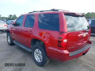 2013 Chevrolet Tahoe LS with VIN 1GNSCAE00DR359498, listed as a IAAI auction lot 40125477 with 156,100 mi miles and . Bid and sale history available at DreamBid. Image 3.
