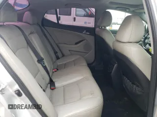 2015 Kia Optima EX z VIN 5XXGN4A71FG396076, wystawiony jako Copart lot #55306755 z przebiegiem 59 330 mil mil oraz Szkoda całkowita • Salvage title. Historia ofert i sprzedaży dostępna na DreamBid. Obrazek 10.
