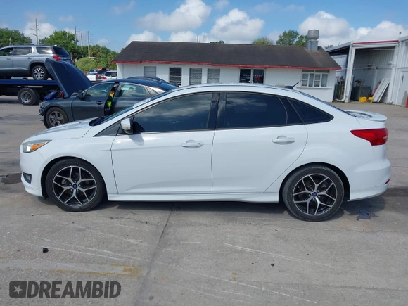 2016 Ford Focus SE with VIN 1FADP3F2XGL356462, listed as a IAAI auction lot 41941656 with 85,904 mi miles. Bid and sale history available at carsss.com. Image 14.