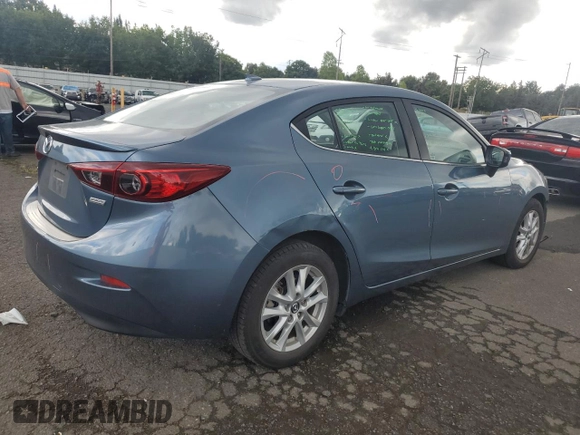 2016 Mazda 3 i Touring with VIN JM1BM1W71G1285237, listed as a Copart auction lot 71208844 with 94,534 mi miles and Salvage Title. Bid and sale history available at DreamBid. Image 3.