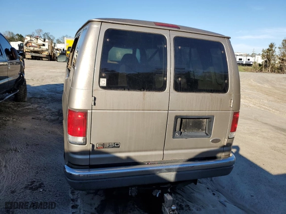 2001 Ford Econoline Wagon XL with VIN 1FBSS31LX1HA23564, listed as a Copart auction lot 77703044 with 276,538 mi miles and Salvage Title. Bid and sale history available at carsss.com. Image 6.