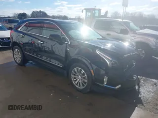 2017 Cadillac XT5 Luxury FWD with VIN 1GYKNBRS5HZ164209, listed as a IAAI auction lot 41213572 with 144,039 mi miles. Bid and sale history available at carsss.com. Image 1.