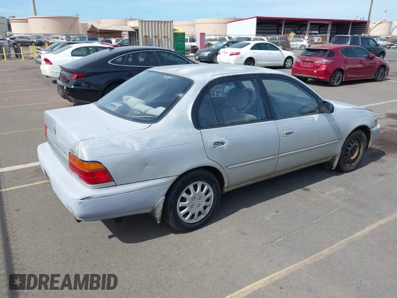 1994 Toyota Corolla Deluxe with VIN JT2AE09B5R0053731, listed as a IAAI auction lot 42606147 with 117,035 mi miles and . Bid and sale history available at DreamBid. Image 4.