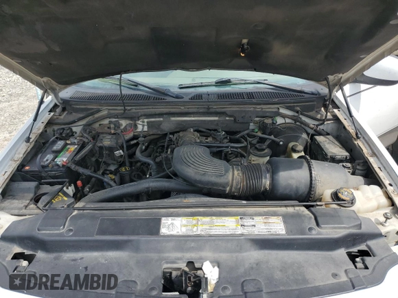 2001 Ford F-150 XL with VIN 1FTRX08L51KE49004, listed as a Copart auction lot 60470745 with 199,490 mi miles and Salvage title. Bid and sale history available at DreamBid. Image 11.