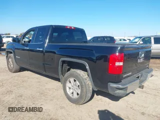 2015 GMC Sierra 1500 SLE z VIN 1GTR1UEC9FZ334983, wystawiony jako IAAI lot #41268146 z przebiegiem 203 084 mil mil oraz . Historia ofert i sprzedaży dostępna na DreamBid. Obrazek 3.