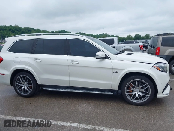 2018 Mercedes-Benz GLS 63 AMG with VIN 4JGDF7FE1JB099084, listed as a IAAI auction lot 42220385 with 97,904 mi miles and . Bid and sale history available at DreamBid. Image 13.