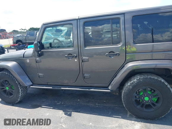 2017 Jeep Wrangler Unlimited Sahara with VIN 1C4BJWEG2HL612421, listed as a IAAI auction lot 42355409 with 81,708 mi miles and . Bid and sale history available at DreamBid. Image 14.