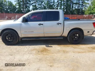 2012 Nissan Titan SV with VIN 1N6BA0ED8CN320723, listed as a IAAI auction lot 42642482 with 214,941 mi miles and . Bid and sale history available at DreamBid. Image 14.