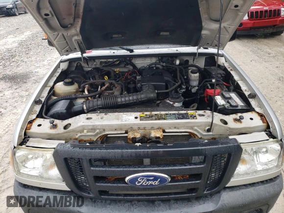2011 Ford Ranger XL z VIN 1FTKR1ED9BPA34948, wystawiony jako Copart lot #60125705 z przebiegiem 123 083 mil mil oraz Czysty tytuł • Clean title. Historia ofert i sprzedaży dostępna na DreamBid. Obrazek 11.