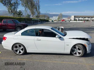 2007 BMW 3 Series 335i with VIN WBAWL73547PX47052, listed as a IAAI auction lot 41700828 with 64,409 mi miles. Bid and sale history available at carsss.com. Image 13.