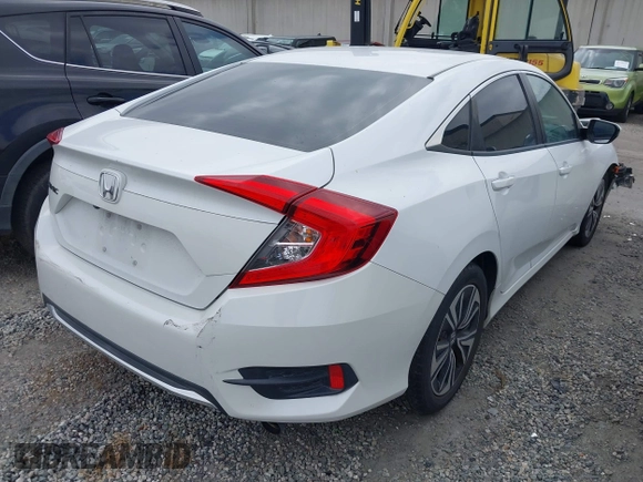 2020 Honda Civic LX with VIN 2HGFC2F64LH593100, listed as a IAAI auction lot 41877572 with 76,713 mi miles and . Bid and sale history available at DreamBid. Image 4.