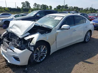 2019 Infiniti Q50 Luxe with VIN JN1EV7ARXKM557946, listed as a IAAI auction lot 40362058 with 56,615 mi miles and . Bid and sale history available at carsss.com. Image 17.