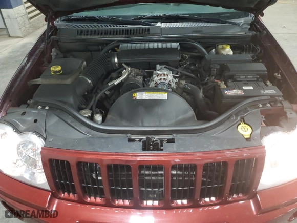 2007 Jeep Grand Cherokee Laredo with VIN 1J8GR48K27C687033, listed as a Copart auction lot 52401165 with 135,146 mi miles and Salvage Title. Bid and sale history available at carsss.com. Image 12.