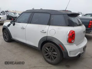 2011 MINI Countryman S with VIN WMWZC3C52BWL78647, listed as a IAAI auction lot 42459886 with 142,407 mi miles and . Bid and sale history available at DreamBid. Image 3.
