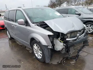2019 Dodge Grand Caravan SXT with VIN 2C4RDGCG2KR802829, listed as a IAAI auction lot 41348556 with 144,289 mi miles. Bid and sale history available at carsss.com. Image 1.