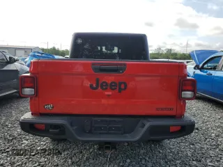 2020 Jeep Gladiator Sport S z VIN 1C6HJTAG3LL149915, wystawiony jako Copart lot #62252205 z przebiegiem 48 705 mil mil oraz Szkoda całkowita • Salvage title. Historia ofert i sprzedaży dostępna na DreamBid. Obrazek 6.