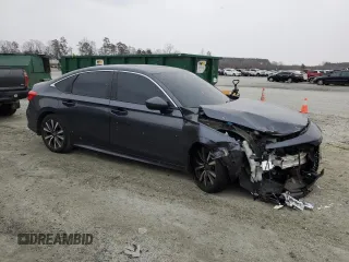 2023 Honda Civic EX z VIN 2HGFE1F70PH306337, wystawiony jako Copart lot #46122695 z przebiegiem 48 200 mil mil oraz Szkoda całkowita • Salvage title. Historia ofert i sprzedaży dostępna na DreamBid. Obrazek 4.